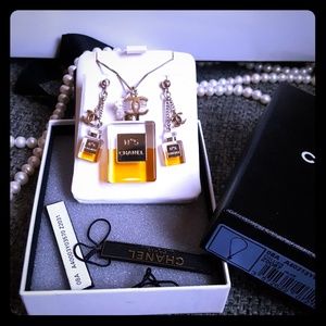 Chanel No. 5 perfum CC logo set.